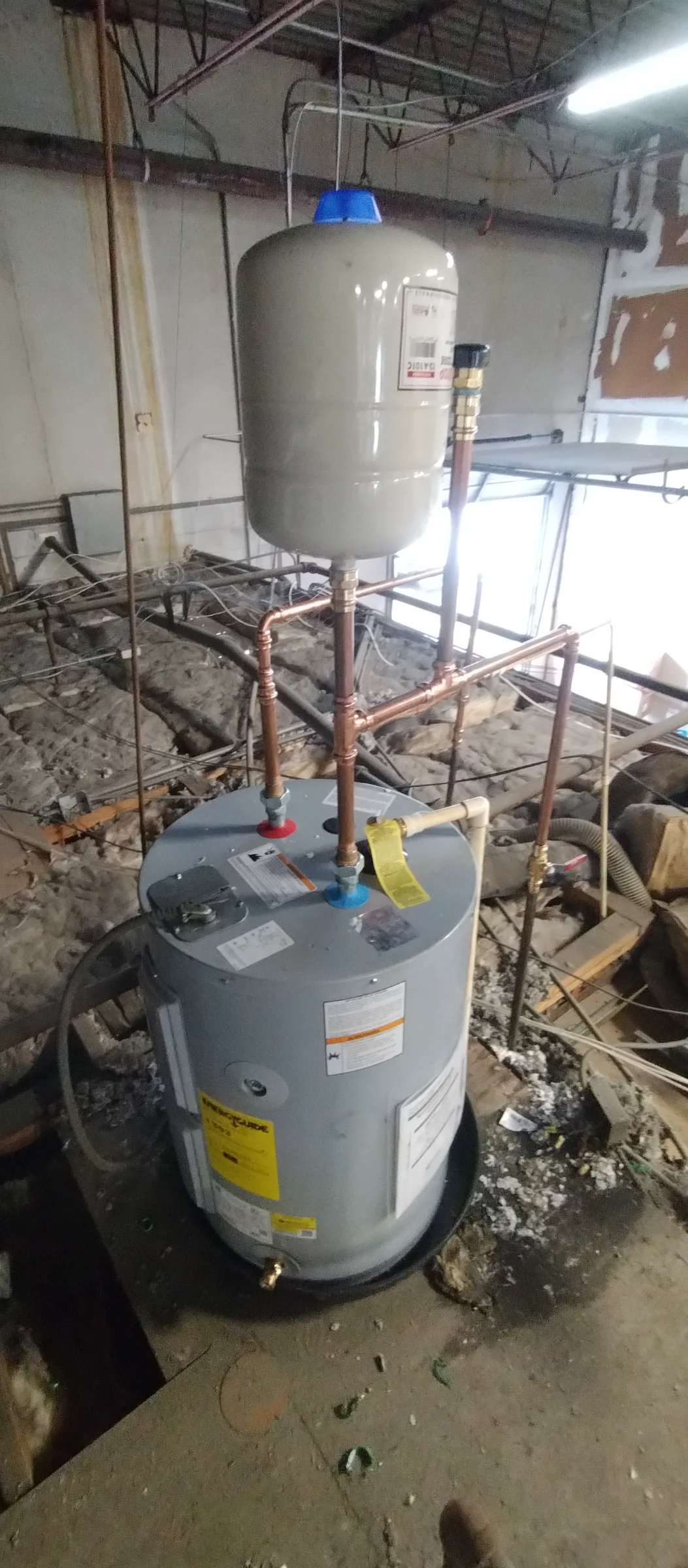 Commercial water heater over ceiling
